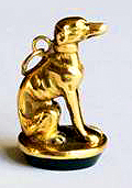 Click to see full size: 1 ) Gold Greyhound fob seal SOLD An 18 carat gold fob seal of a seated Greyhound upon green agate matrix.