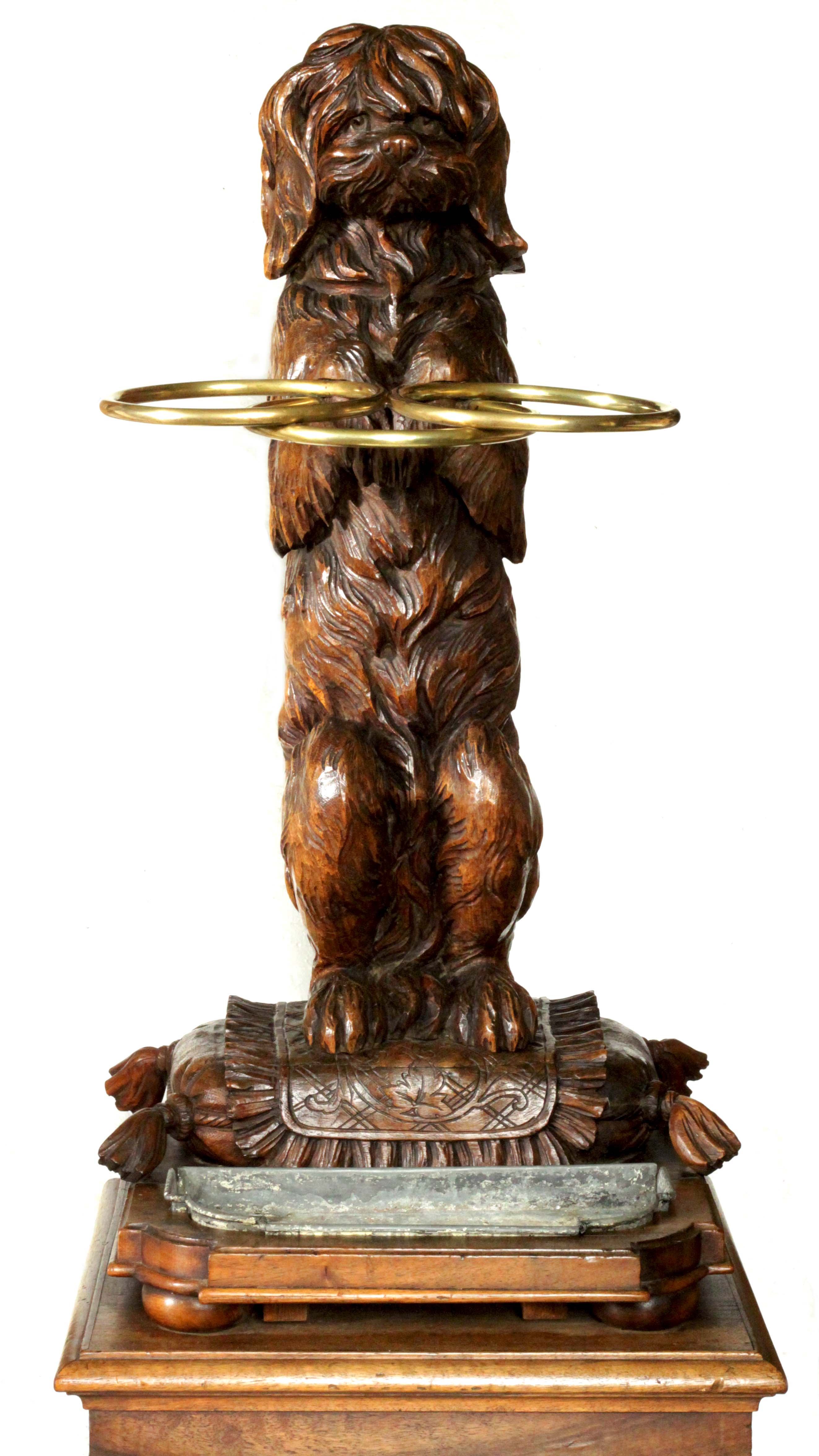 Click to see full size: Black Forest umbrella / cane stand depicting a Maltese