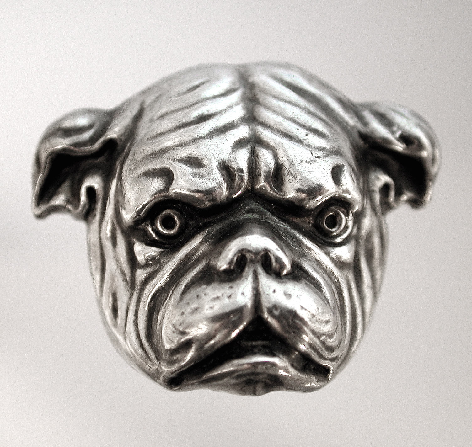 Click to see full size: English Bulldog-   English Bulldog, pin, head study in silver with glass inlaid eyes, marked ?Sterling?, American, circa 1895.