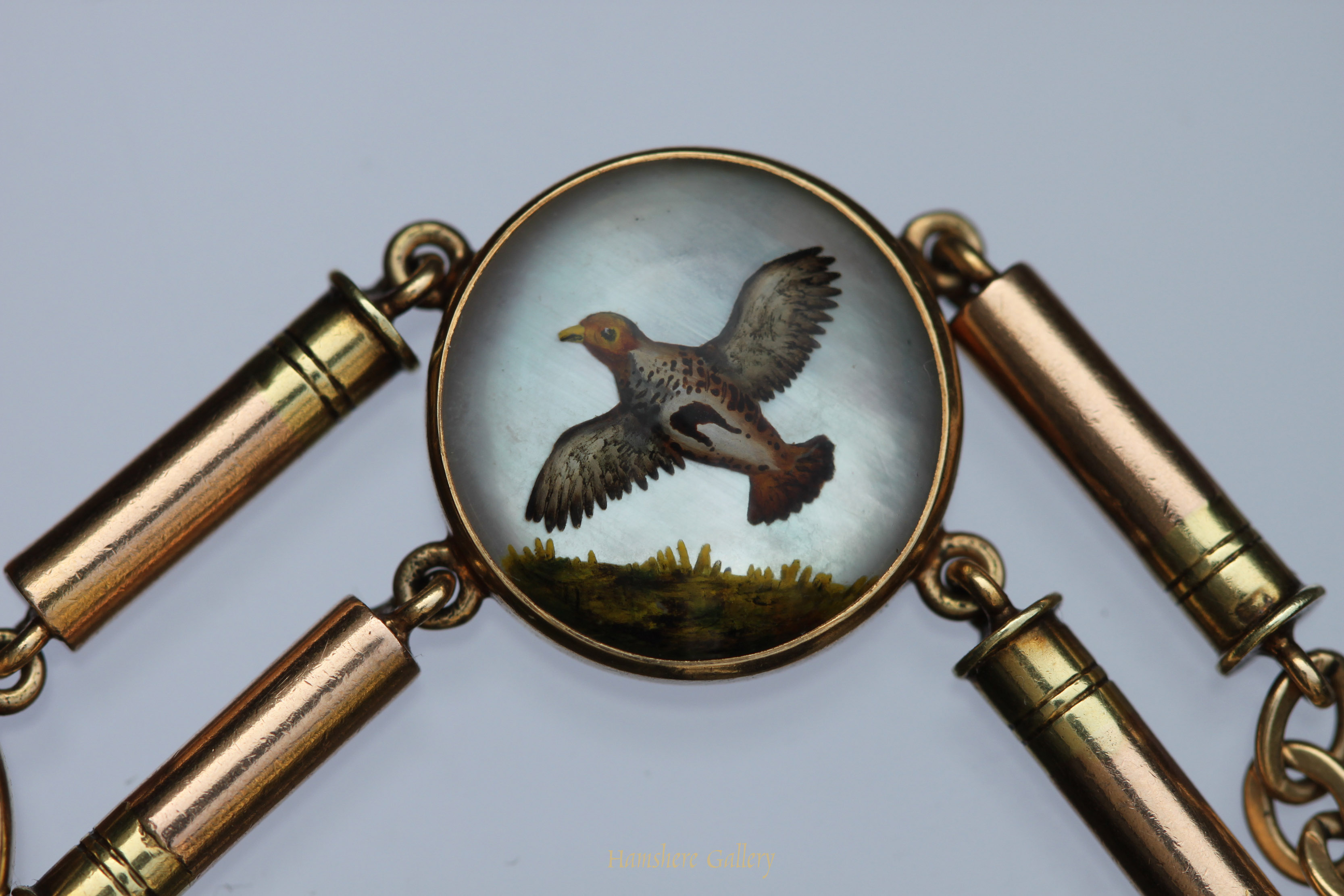 Click for larger image: Reverse intaglio crystal game bird gold bracelet  - Reverse intaglio crystal game bird gold bracelet 