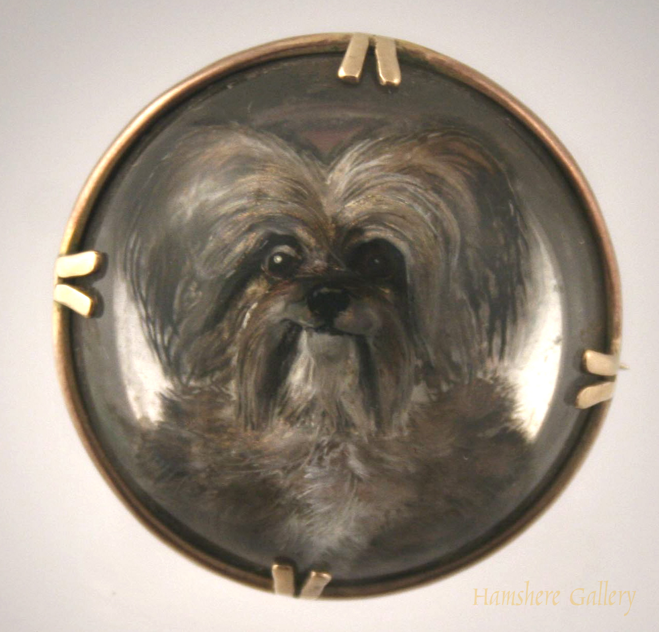 Click to see full size: Skye Terrier reverse intalgio crystal brooch 