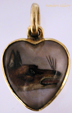 Click to see full size: Reverse intaglio crystal of a snarling fox�s head