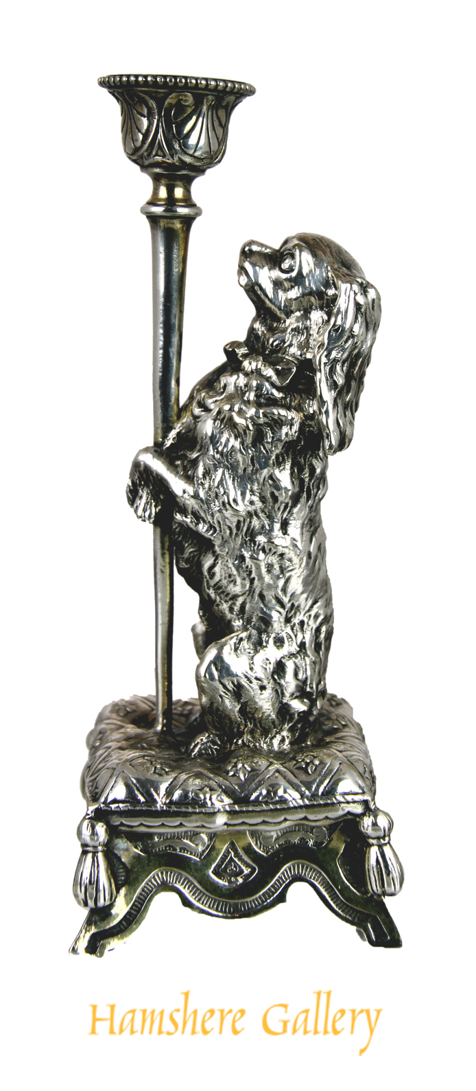 Click for larger image: A rare mid 19th century silver plated King Charles Cavalier Spaniel taperstick / candlestick by Elkington & Co, after John Bell (English, 1811-1895) - A rare mid 19th century silver plated King Charles Cavalier Spaniel taperstick / candlestick by Elkington & Co, after John Bell (English, 1811-1895)