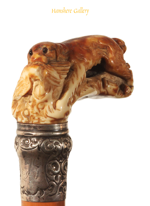 Click for larger image: A Victorian ivory handled Spaniel silver mounted walking cane - A Victorian ivory handled Spaniel silver mounted walking cane