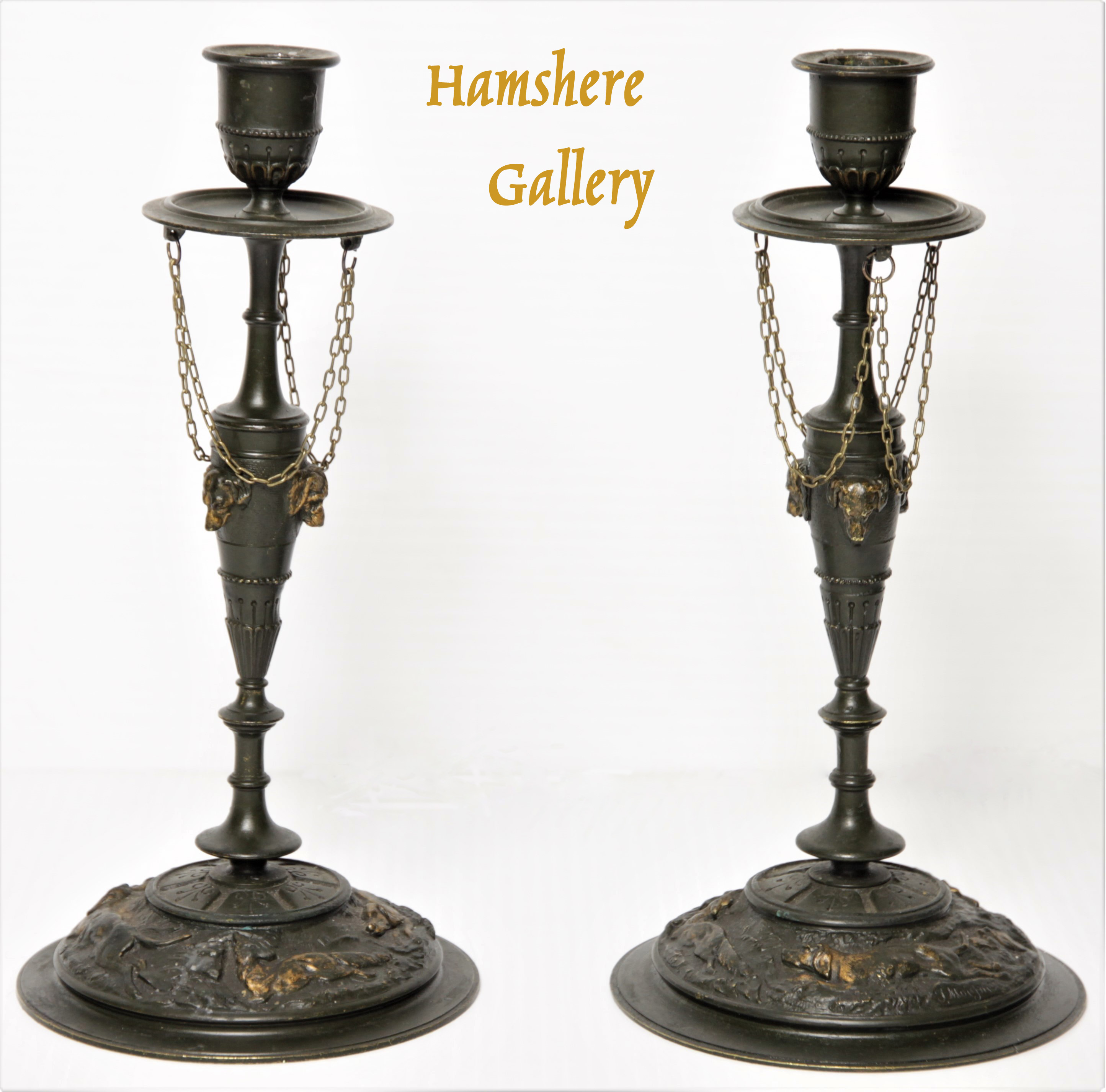 Click to see full size: A pair of Setter bronze candlesticks by Jules Moigniez (French, 1835-1894)- A pair of Setter bronze candlesticks by Jules Moigniez (French, 1835-1894)