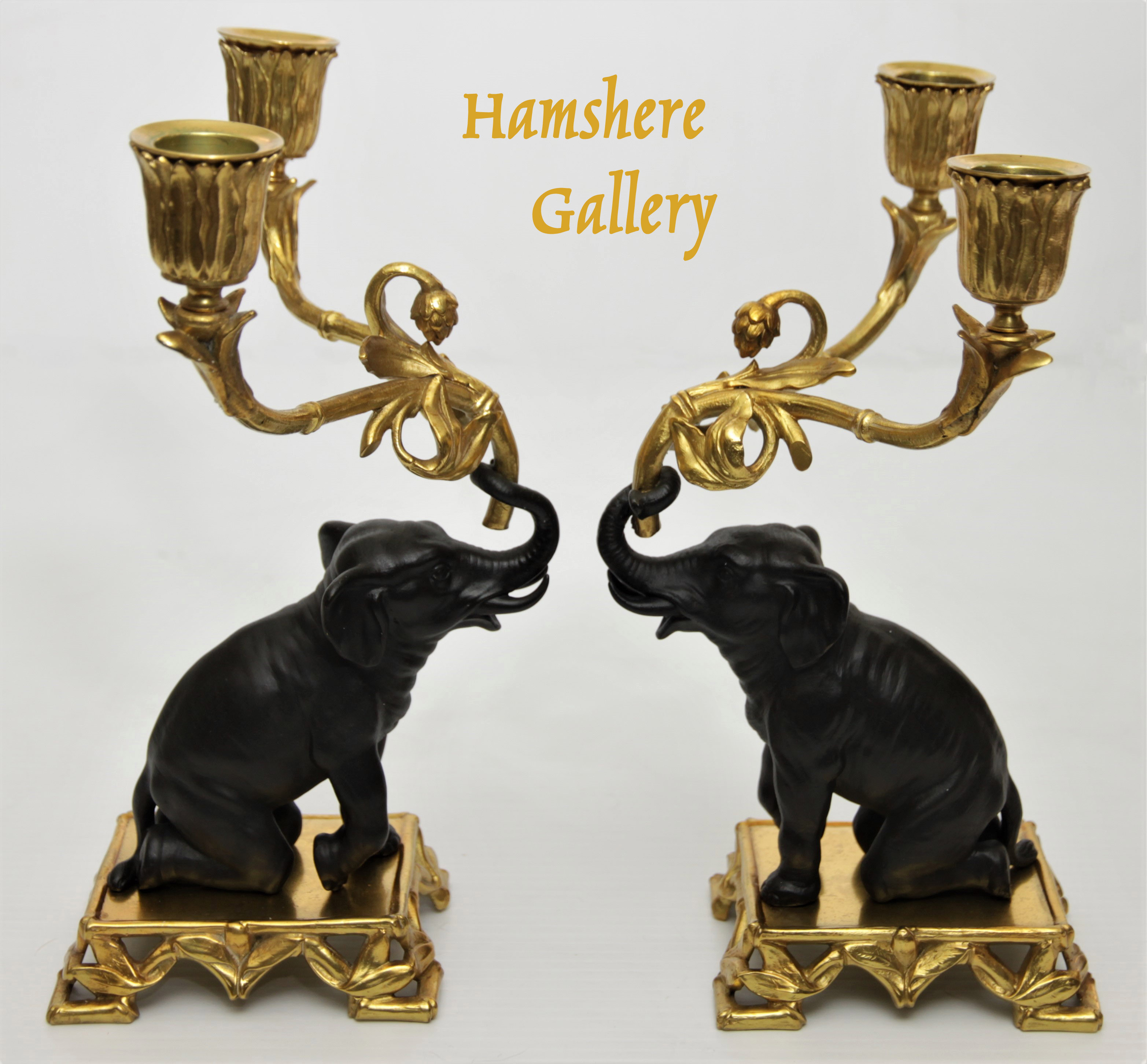 Click to see full size: Late 19th, French bronze and ormolu pair of elephant candelabra / candlesticks