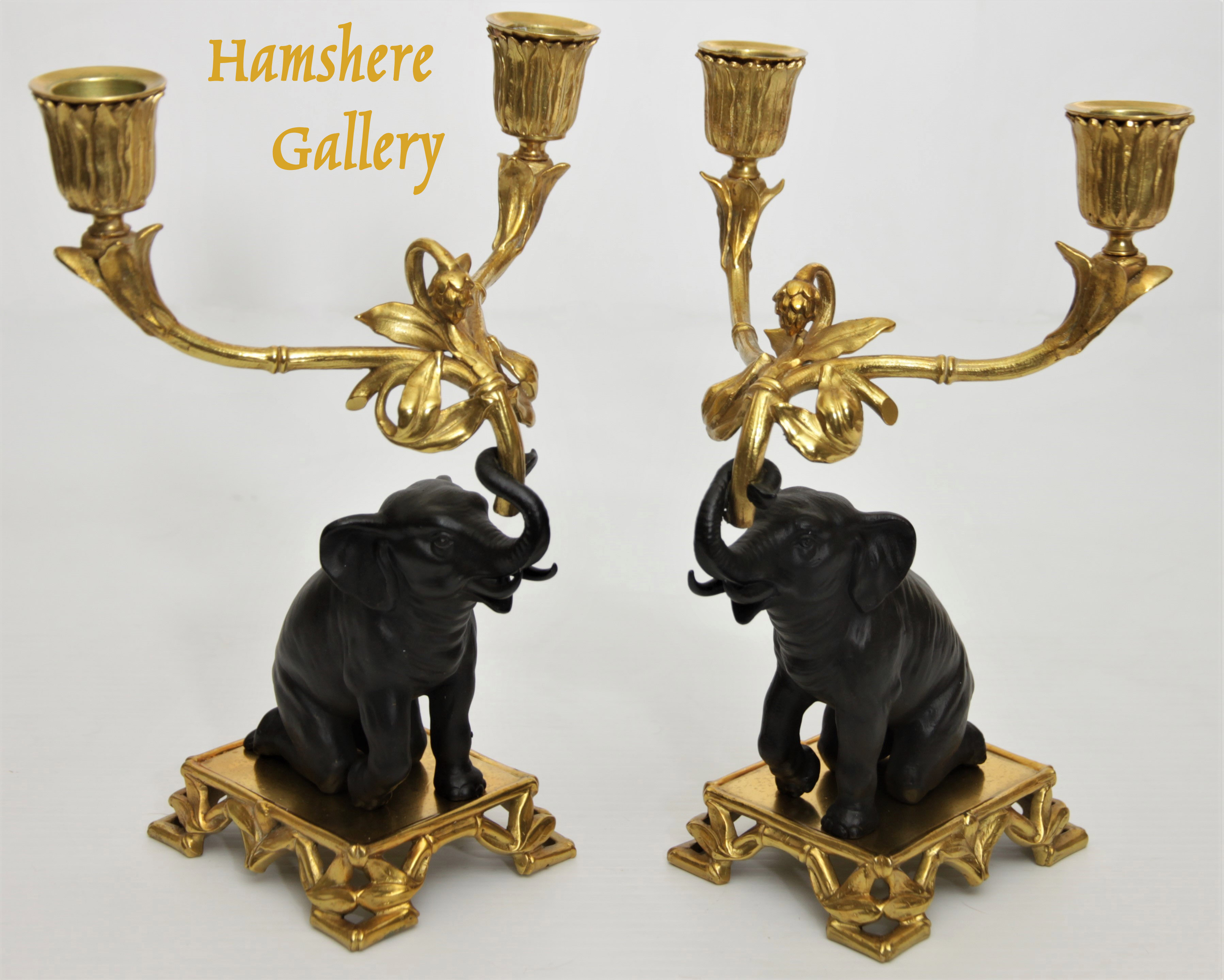 Click for larger image: Late 19th, French bronze and ormolu pair of elephant candelabra / candlesticks - Late 19th, French bronze and ormolu pair of elephant candelabra / candlesticks