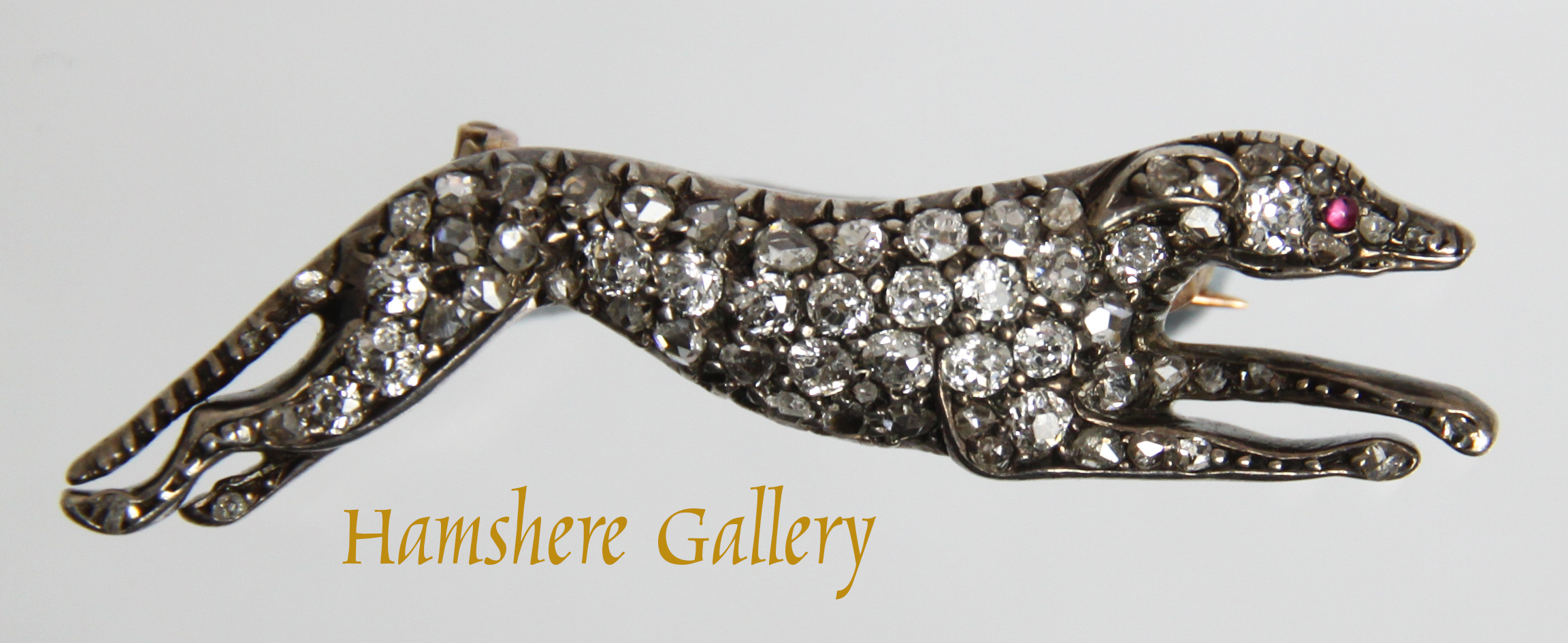 Click to see full size: A Victorian diamond coursing Greyhound brooch- A Victorian diamond coursing Greyhound brooch