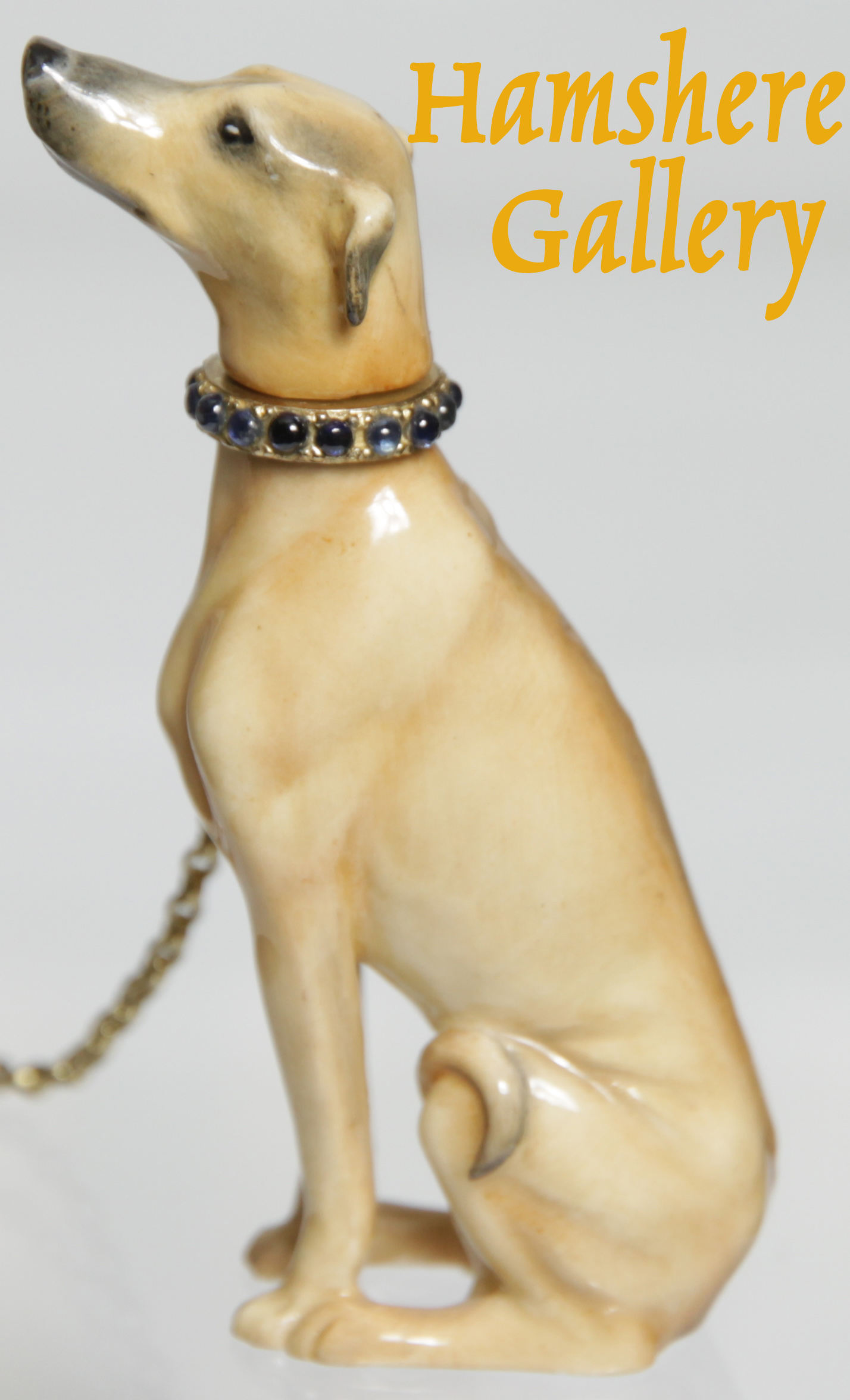 Click to see full size: A porcelain Greyhound gem set perfume flacon- A porcelain Greyhound gem set perfume flacon