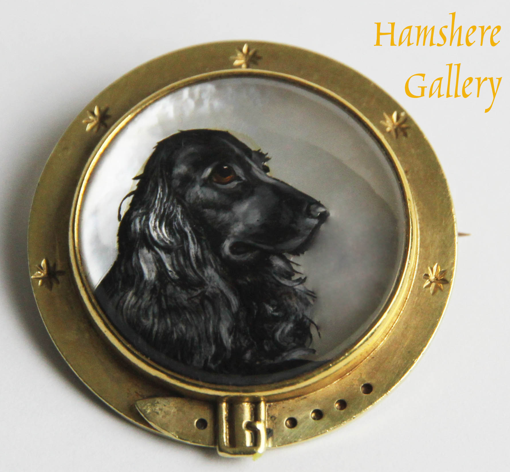 Click to see full size: Cocker Spaniel, American, 1930â€™s, reverse intaglio 14 carat gold set crystal brooch and pendant