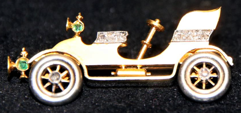 Click to see full size: Rare automobile brooch with revolving wheels 