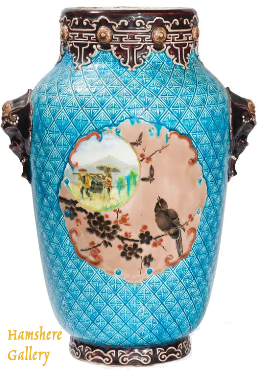 Click to see full size: Rare Japanese, Hokusai, inspired elephant handled vase, by Amédée de Caranza for Jules Vieillard & Cie, of Bordeaux.