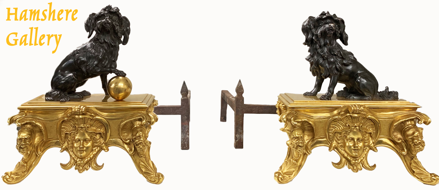 Click to see full size: A rare pair of mid 19th, French, ormolu and bronze Poodle / Barbet chenets / fire dogs / andirons inspired by designs by Jacques Caffieri (1678-1755).- A rare pair of mid 19th, French, ormolu and bronze Poodle / Barbet chenets / fire dogs / andirons inspired by designs by Jacques Caffieri (1678-1755).
