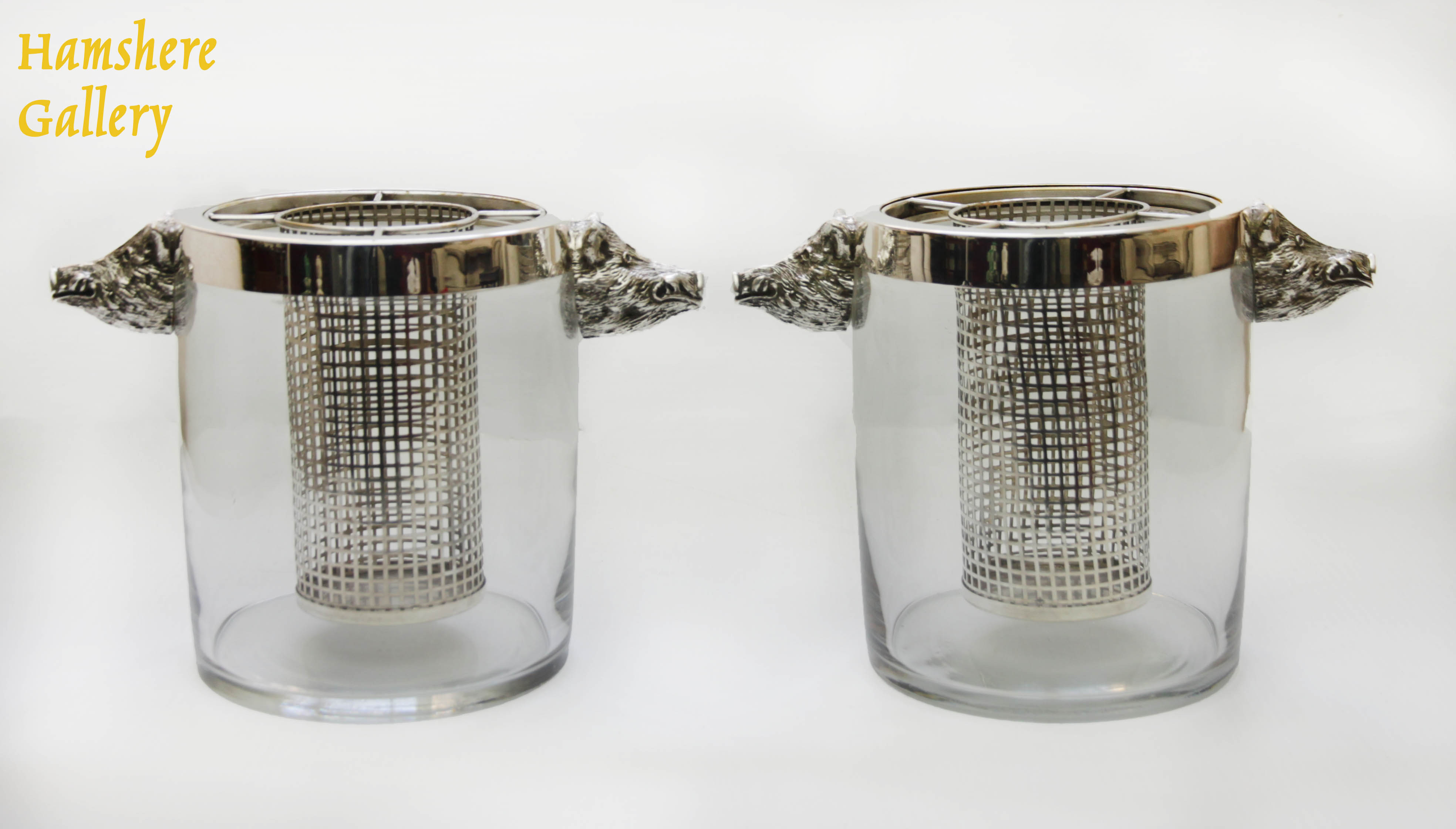 Click to see full size: A pair of Art Deco silver plated and glass boar wine coolers