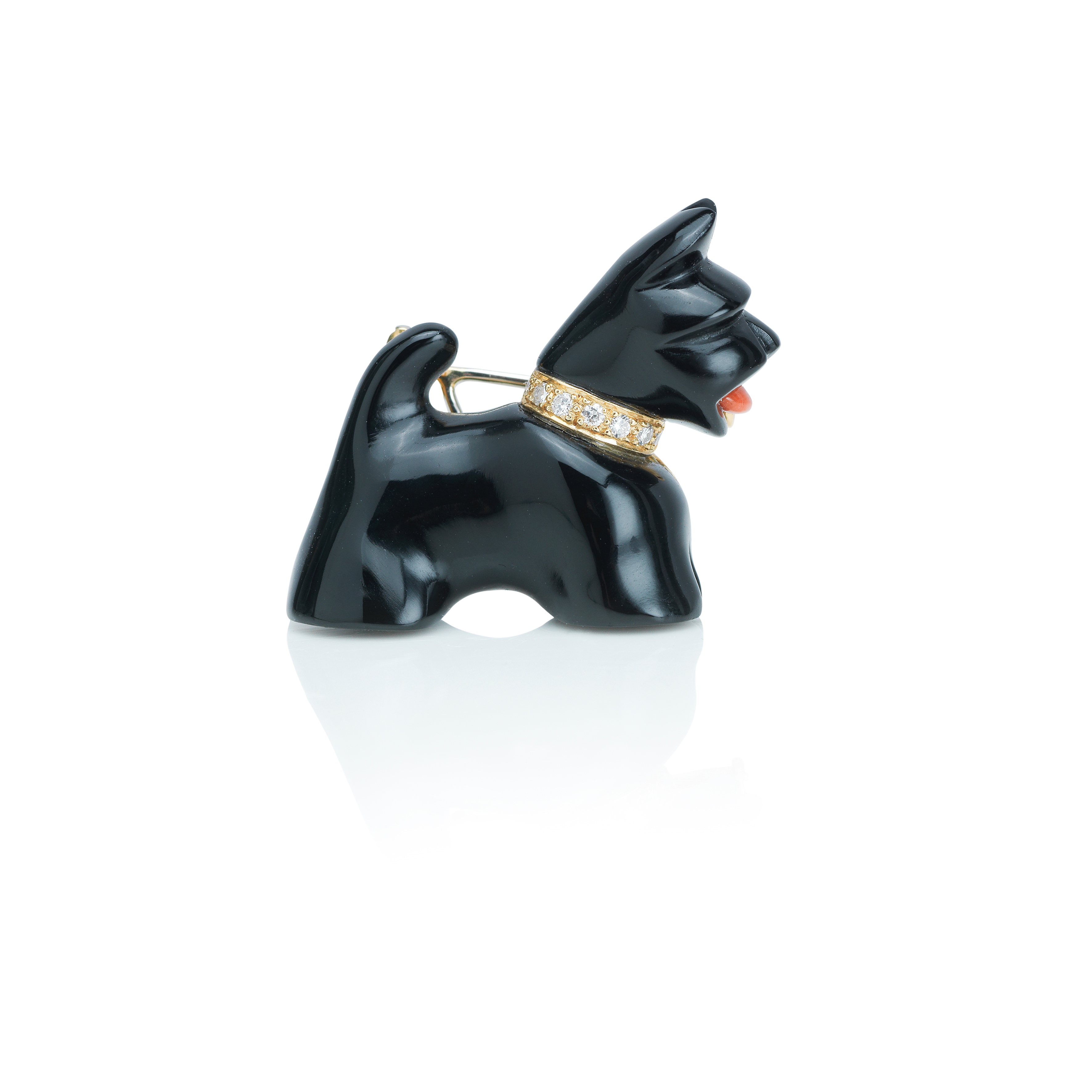 Click to see full size: An onyx and gem-set scottie dog brooch
